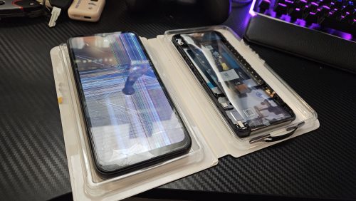 Phone getting a fresh screen and tempered-glass protector at Device Hero in Manor, TX
