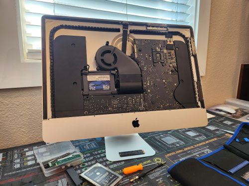 iMac opened from the back for a fan and SSD upgrade at Device Hero in Manor, TX