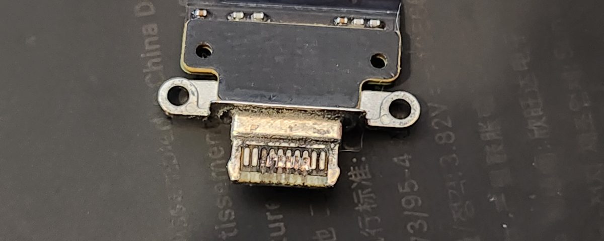 Close-up of a replacement USB-C charging port