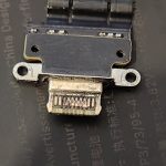 Close-up of a replacement USB-C charging port