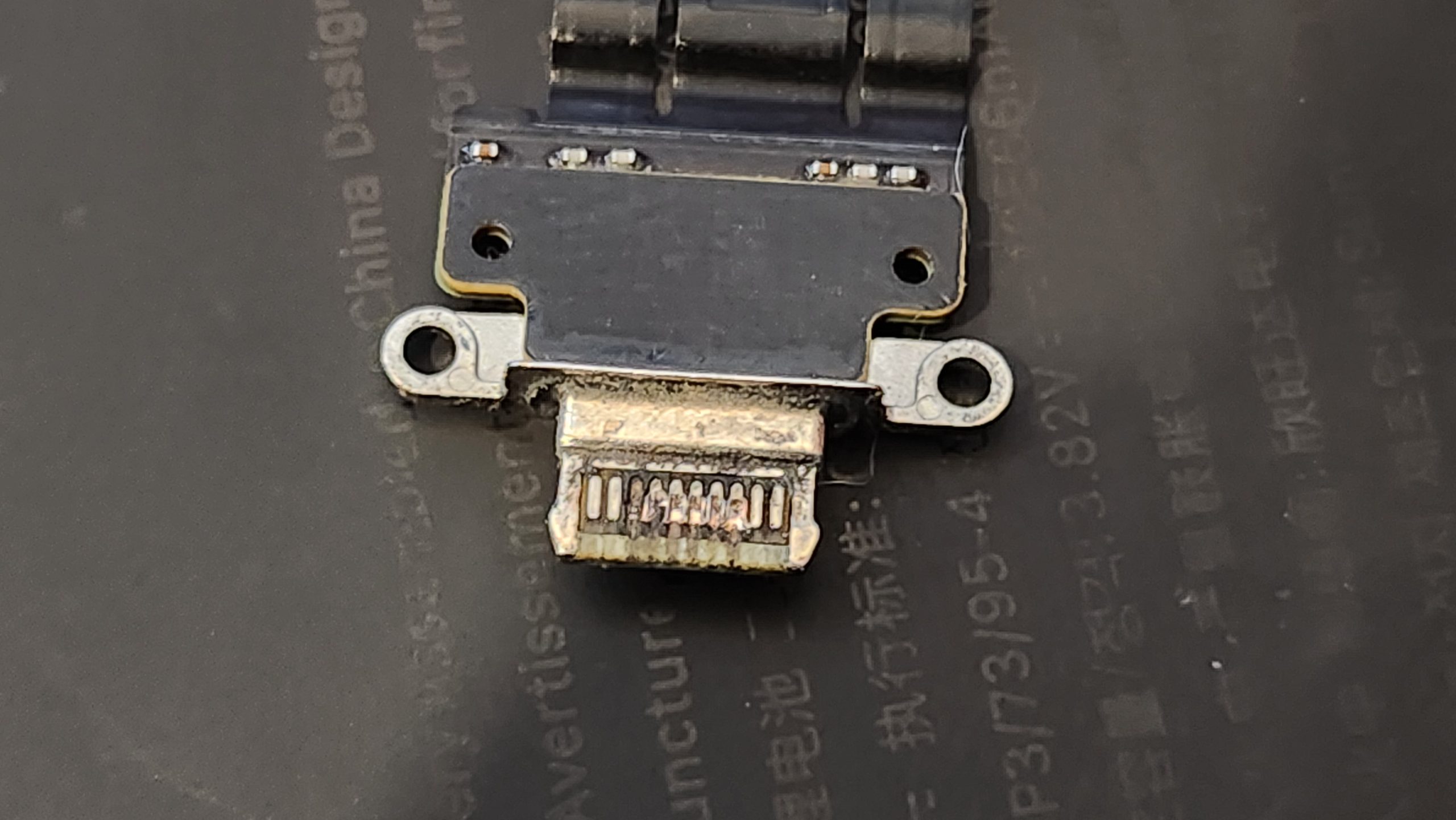 Close-up of a replacement USB-C charging port