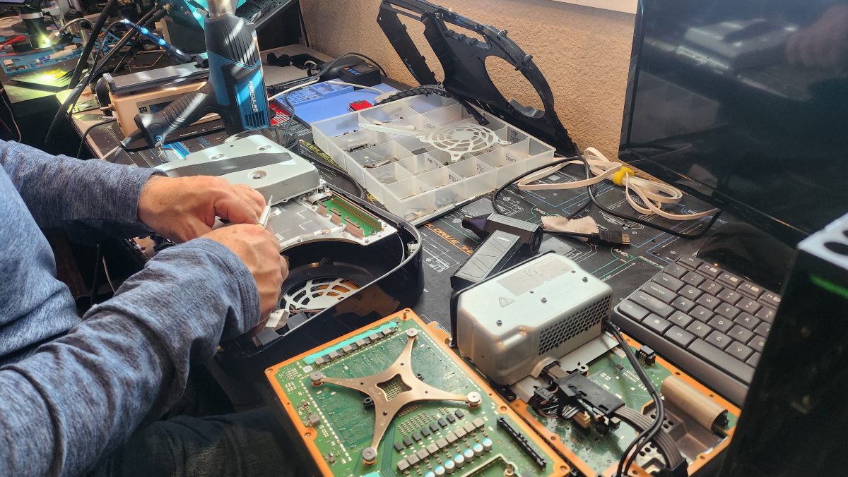 Technician repairing a device on the bench at Device Hero, serving Pflugerville, TX