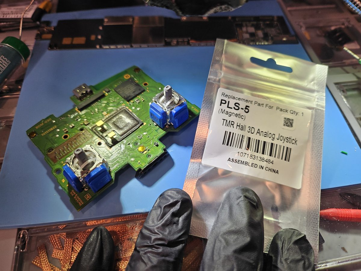 PS5 DualSense controller board getting new TMR Hall-effect joysticks installed at Device Hero in Manor, TX