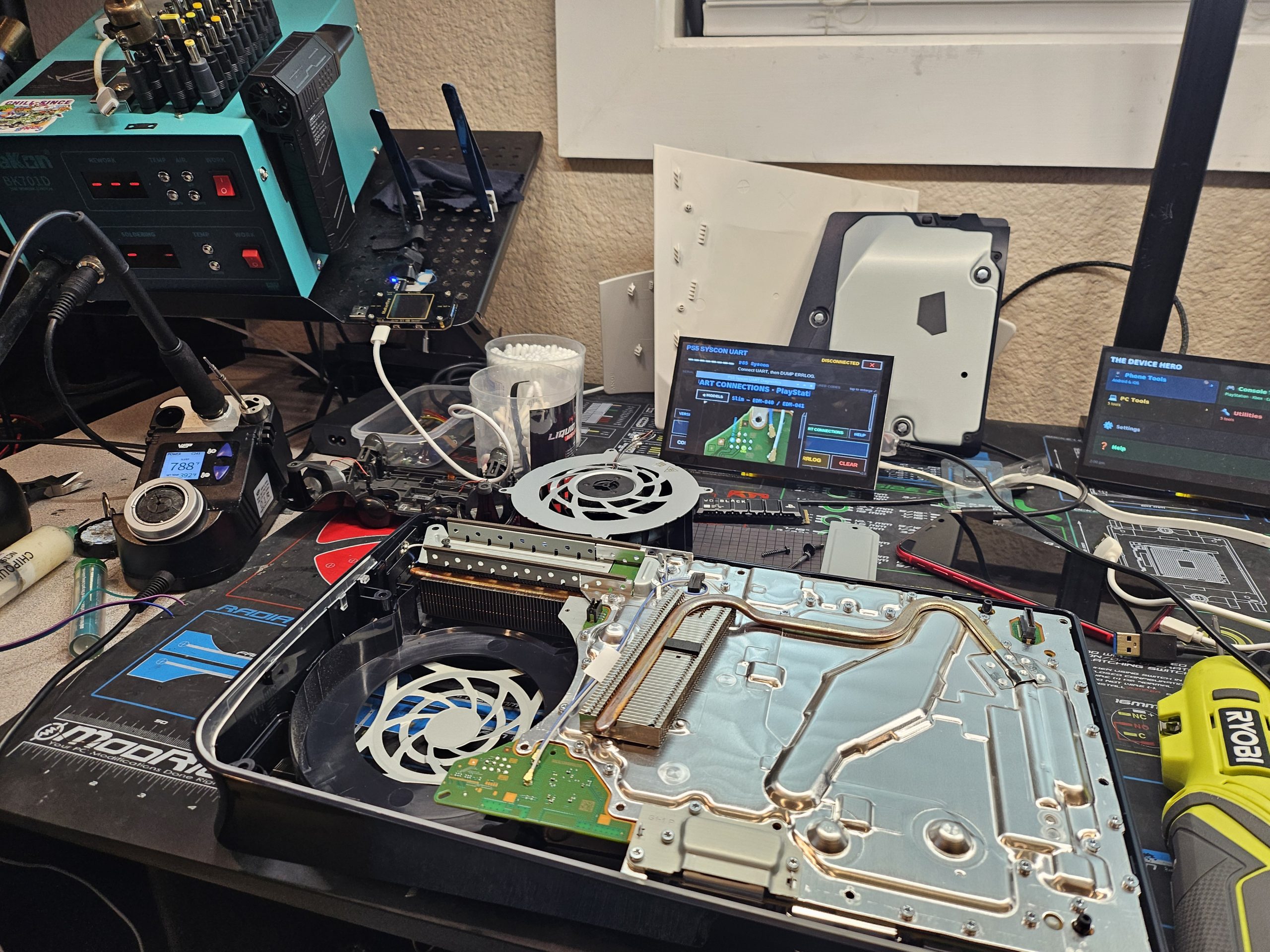 Repair bench with laptops, phones and an iMac at Device Hero, serving Round Rock, TX