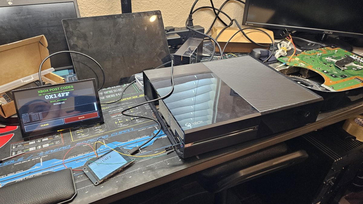 Phones, tablets and consoles on the repair bench at Device Hero, serving East Austin